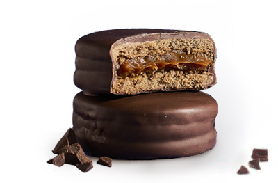 Alfajor-clasico-argentino Alfajor Clasico Argentino cortado a la mitad, dejando ver el relleno de dulce de leche.